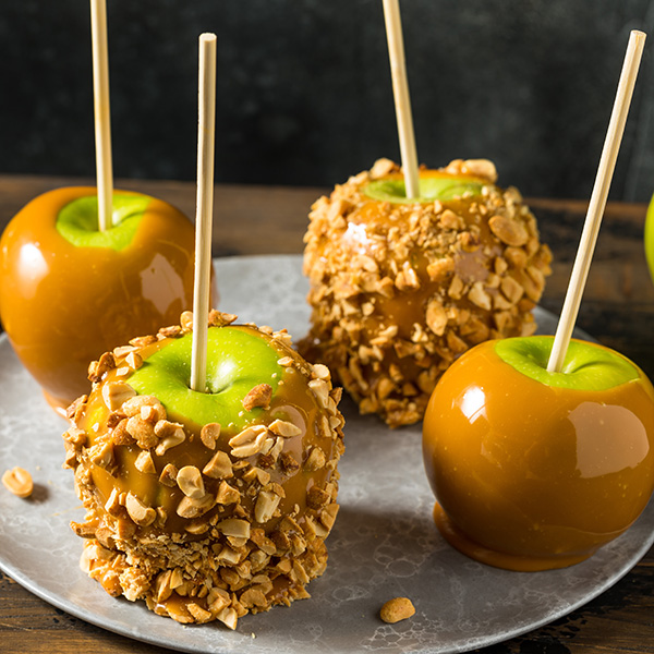 Homemade Halloween Candy Taffy Apples with Caramel and Peanuts
